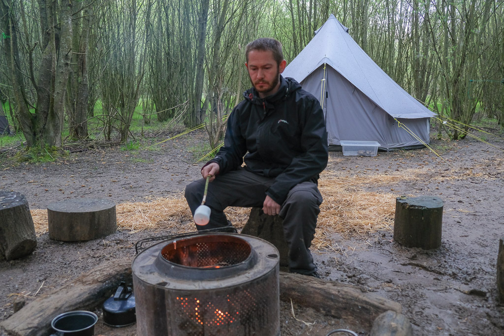 Toasting marshmallows on campfire